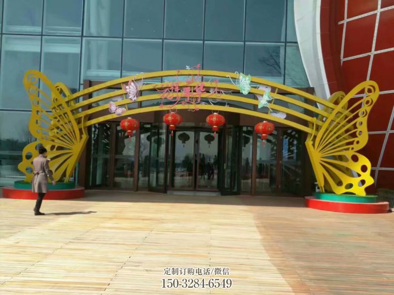 商洛蝴蝶拱门雕塑,镂空烤漆效果,不锈钢小区标识雕塑 商洛蝴蝶拱门雕塑,镂空烤漆效果,不锈钢小区标识雕塑